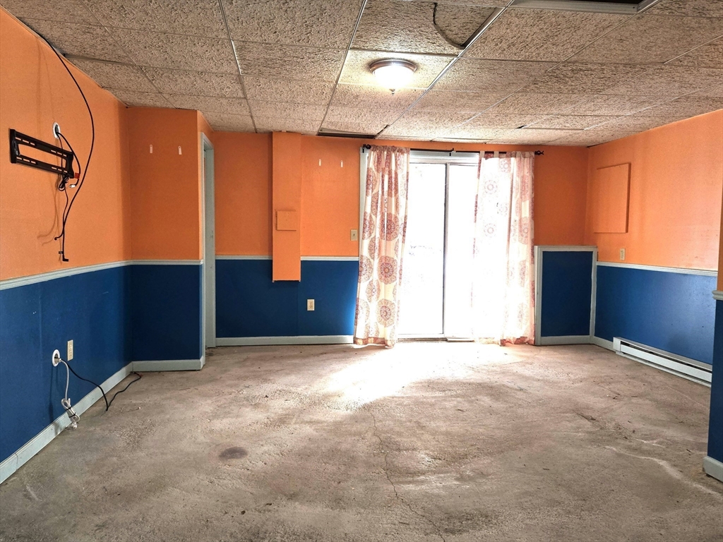 1170 Wilson Road, Unit 1 Fall River, MA 02720 - Photo 24 of 25 an empty room with windows