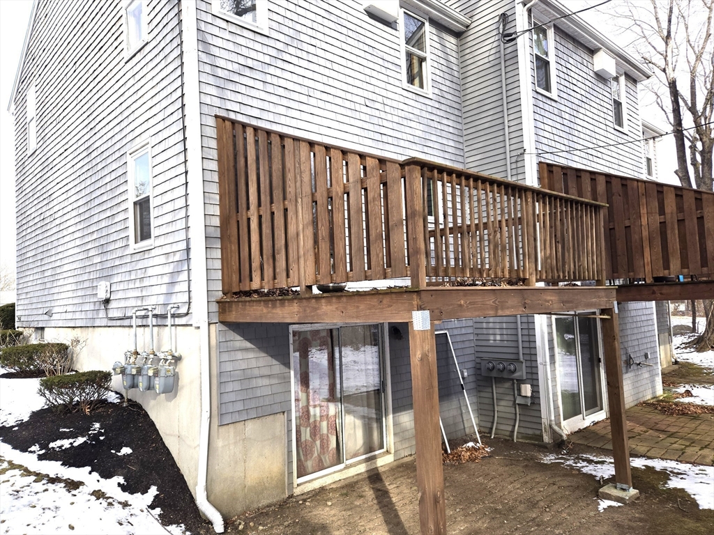 1170 Wilson Road, Unit 1 Fall River, MA 02720 - Photo 25 of 25 a view of a house with a balcony
