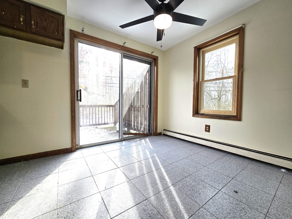 1170 Wilson Road, Unit 1 Fall River, MA 02720 - Photo 4 of 25 a view of an empty room with a window