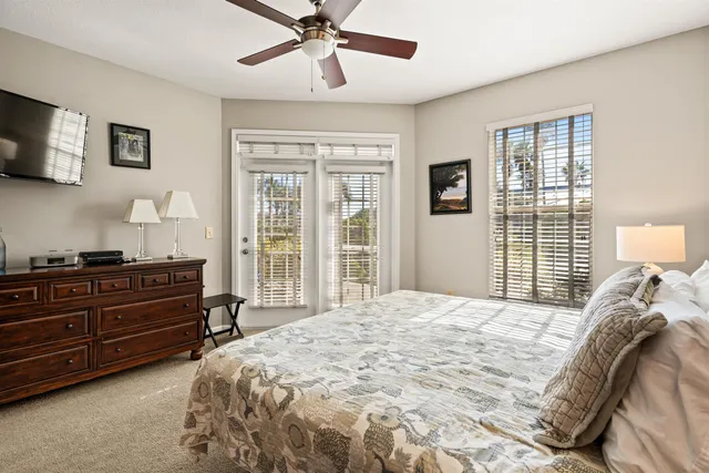 a spacious bathroom with a granite countertop sink a toilet and shower