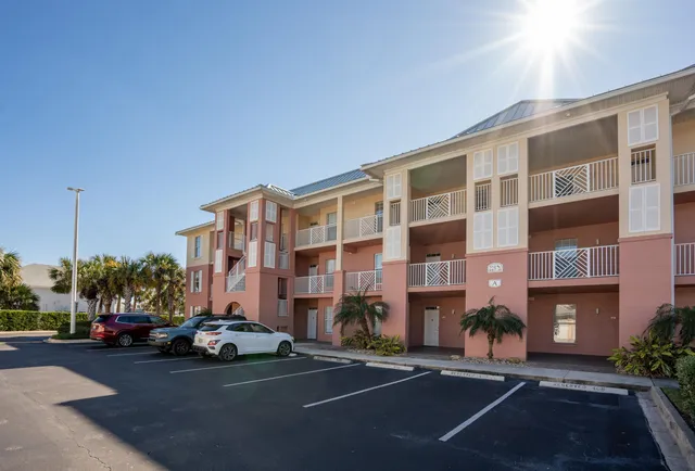 a view of a building with a garden