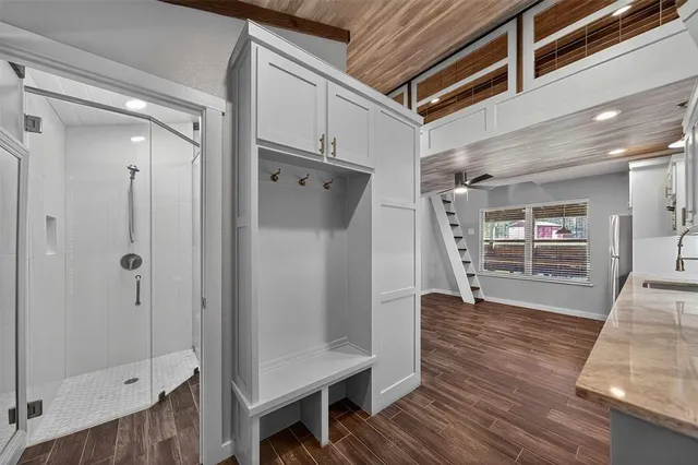 a view of an empty room with stairs