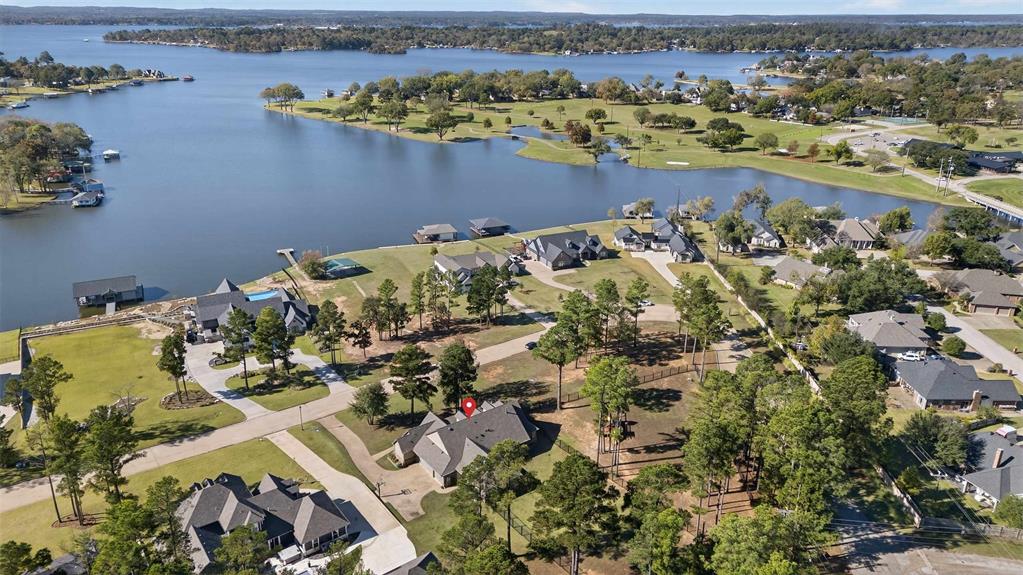 22227 Mallards Cove Bullard, TX 75757 - Photo 5 of 39 an aerial view of a house with a yard