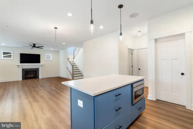 a room with a bed and a flat screen tv