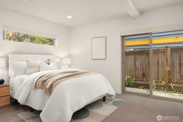 a bathroom with a double vanity sink toilet and shower