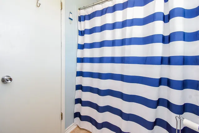 a view of a stairs and wooden floor
