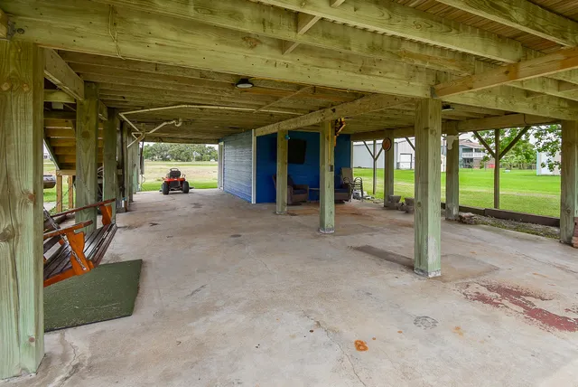 a view of a porch with furniture