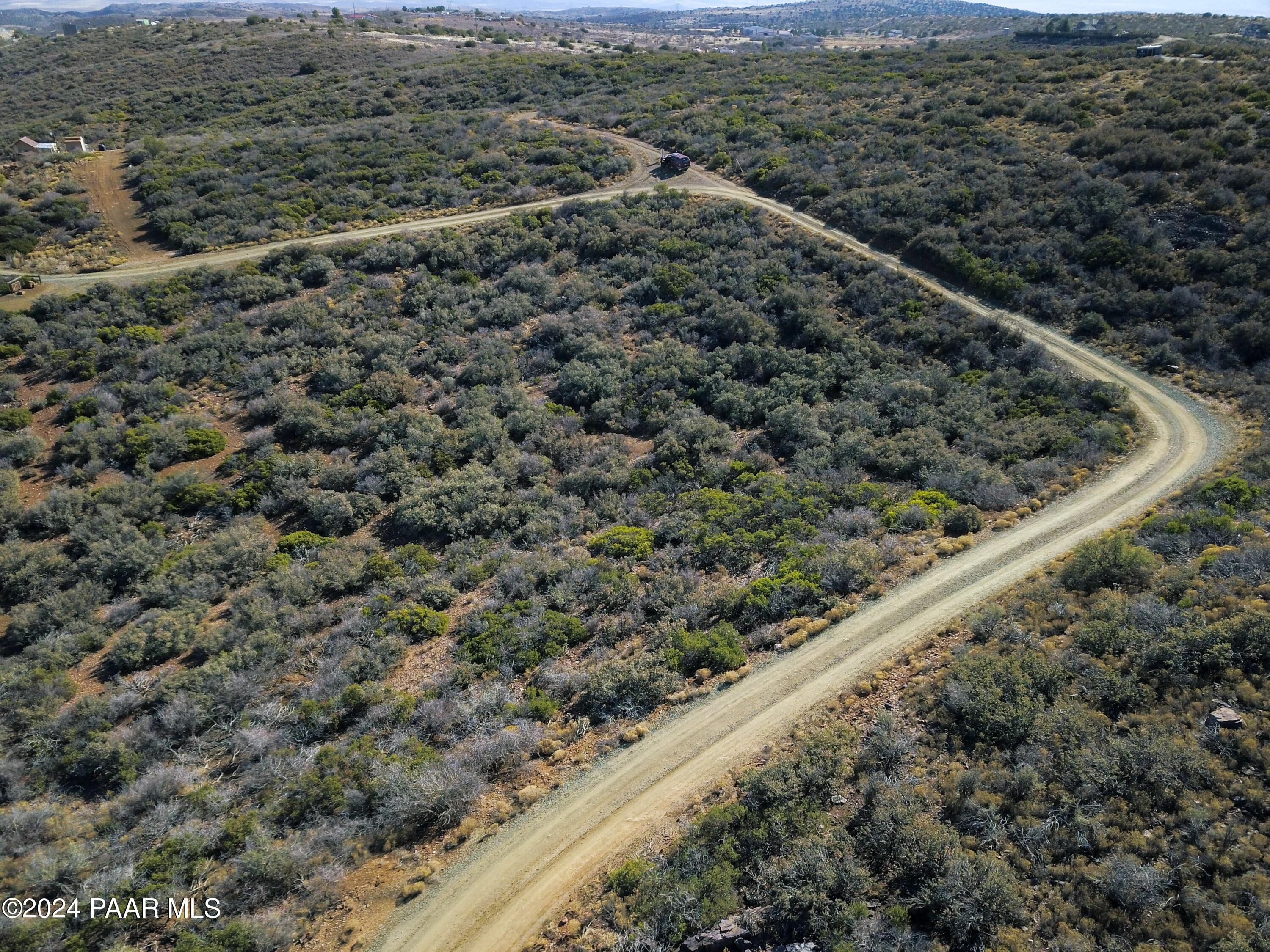 144 South Cobalt Road Mayer, AZ 86333 - Photo 2 of 29 a view of a yard with a plant
