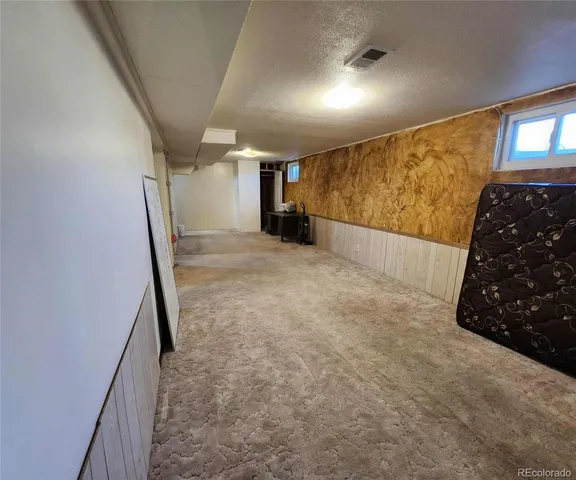 an empty room with a hallway