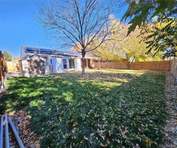 a house with trees in front of it
