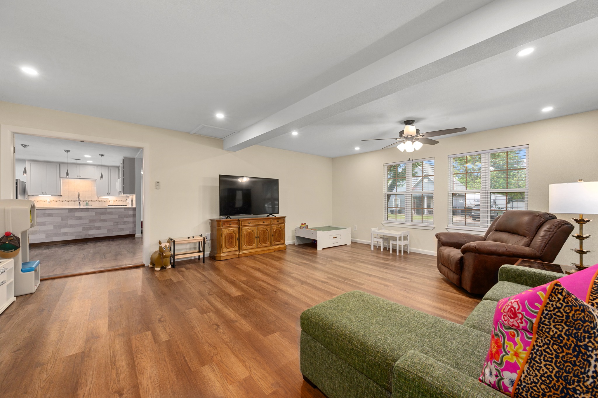 509 East 17th Street Georgetown, TX 78626 - Photo 12 of 40 Recent addition includes a spacious room, full bathroom with walk-in shower, separate entrance and luxury vinyl plan flooring