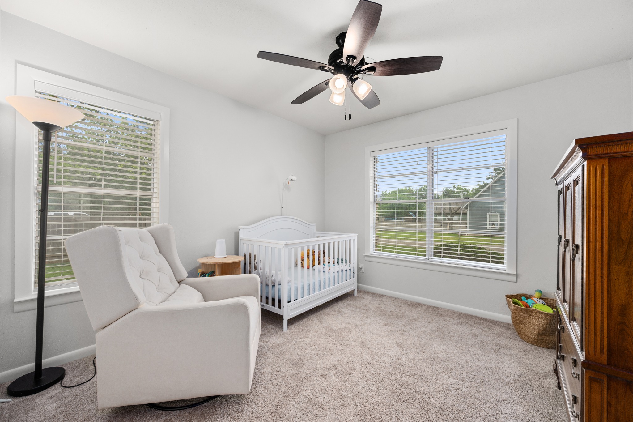 509 East 17th Street Georgetown, TX 78626 - Photo 18 of 40 Secondary bedroom with a closet, ceiling fan and recent carpet
