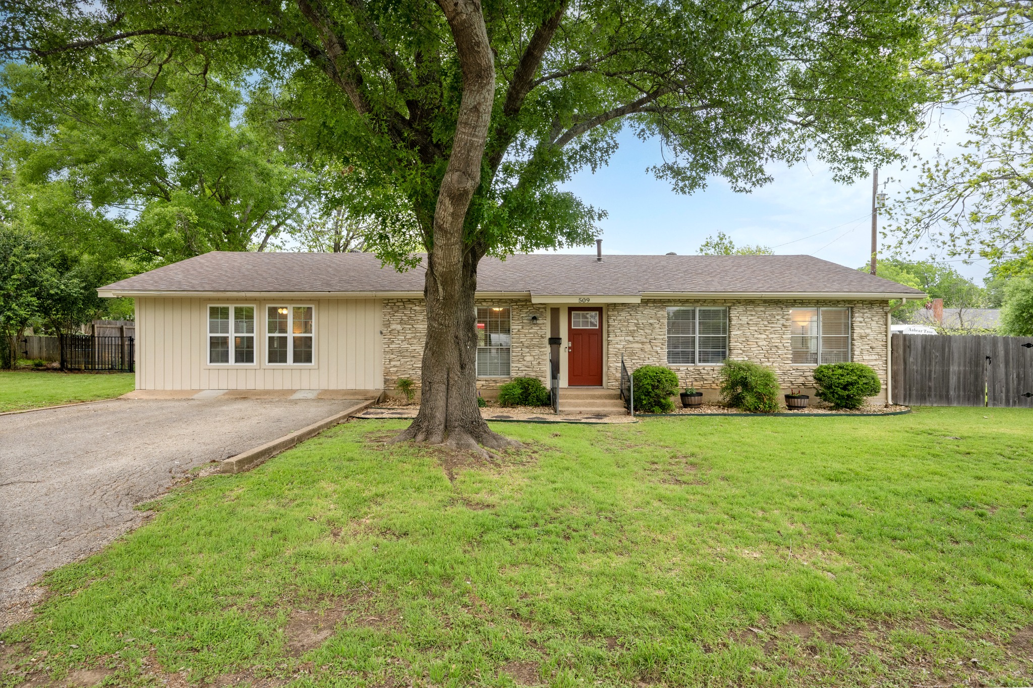 509 East 17th Street Georgetown, TX 78626 - Photo 2 of 40 Peacefully situated in Georgetown’s beloved Old Town neighborhood, this beautifully renovated 3 bedroom, 3 bathroom 1960s home blends timeless character with thoughtful modern updates