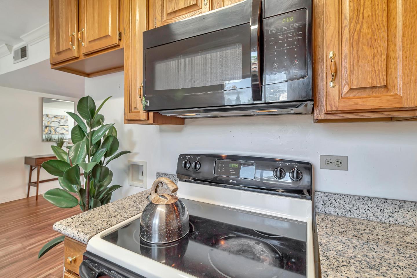103 Muir Road Martinez, CA 94553 - Photo 12 of 33 a kitchen with a sink and a microwave