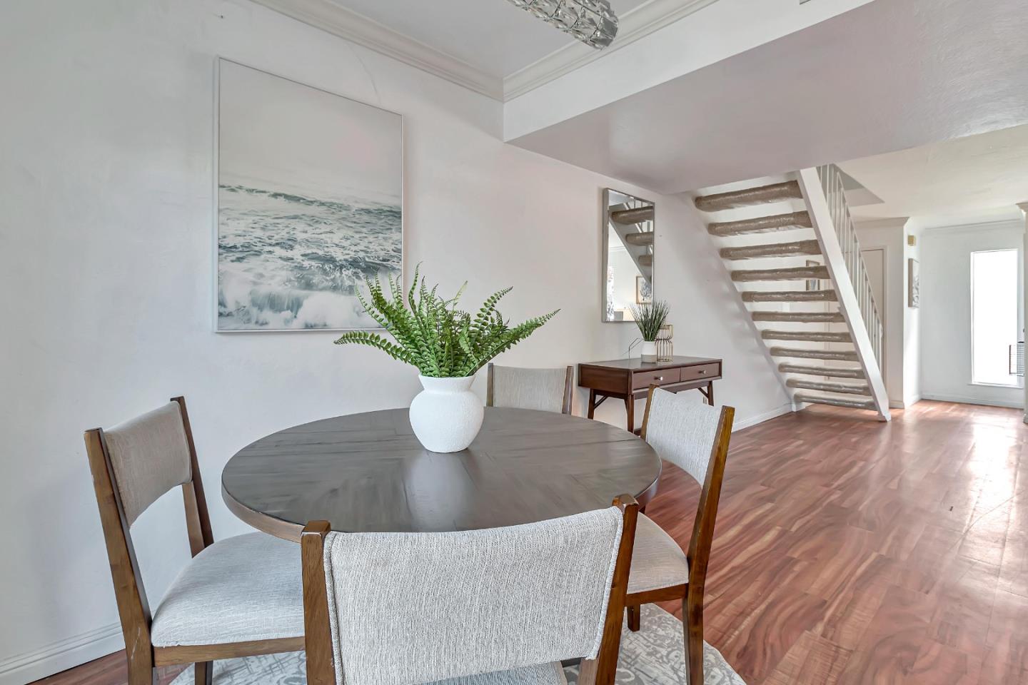 103 Muir Road Martinez, CA 94553 - Photo 15 of 33 a dining room with furniture and wooden floor