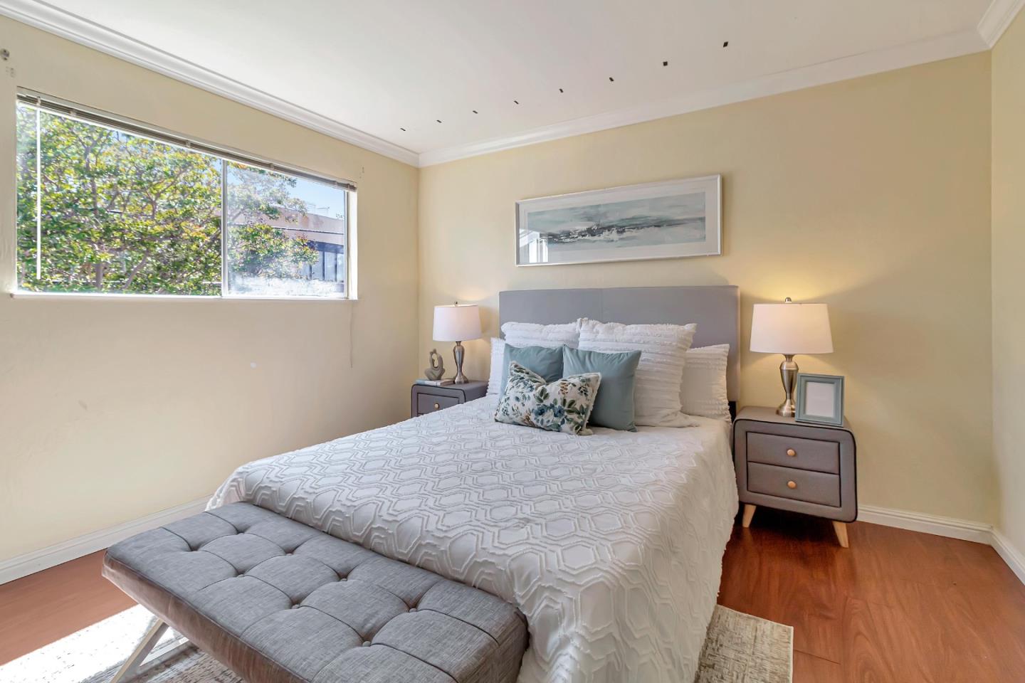 103 Muir Road Martinez, CA 94553 - Photo 20 of 33 a bedroom with a bed and a window