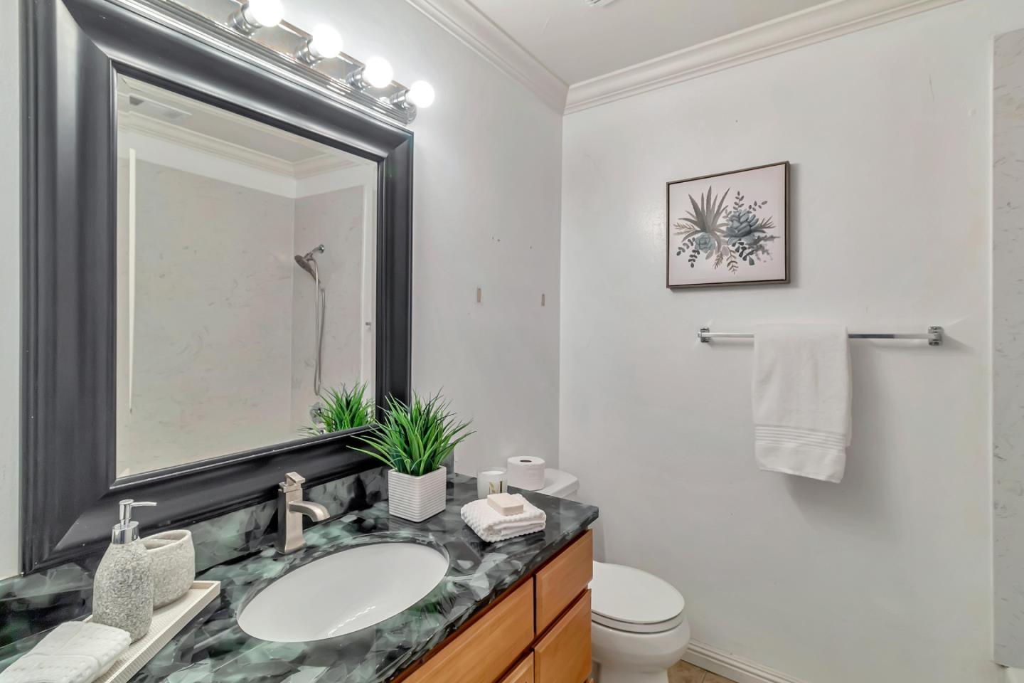 103 Muir Road Martinez, CA 94553 - Photo 24 of 33 a bathroom with a granite countertop sink mirror and toilet