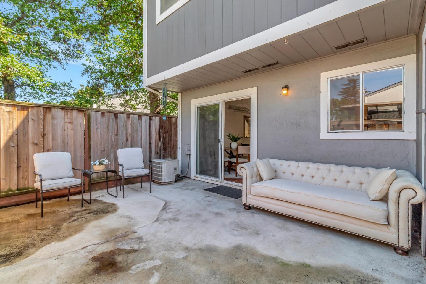 103 Muir Road Martinez, CA 94553 - Photo 30 of 33 a living room with furniture and a potted plant