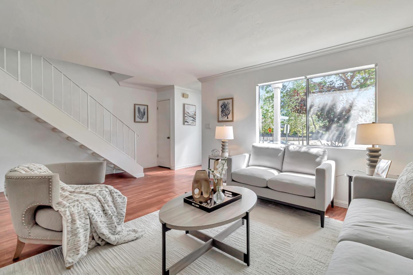 103 Muir Road Martinez, CA 94553 - Photo 6 of 33 a living room with furniture and a table