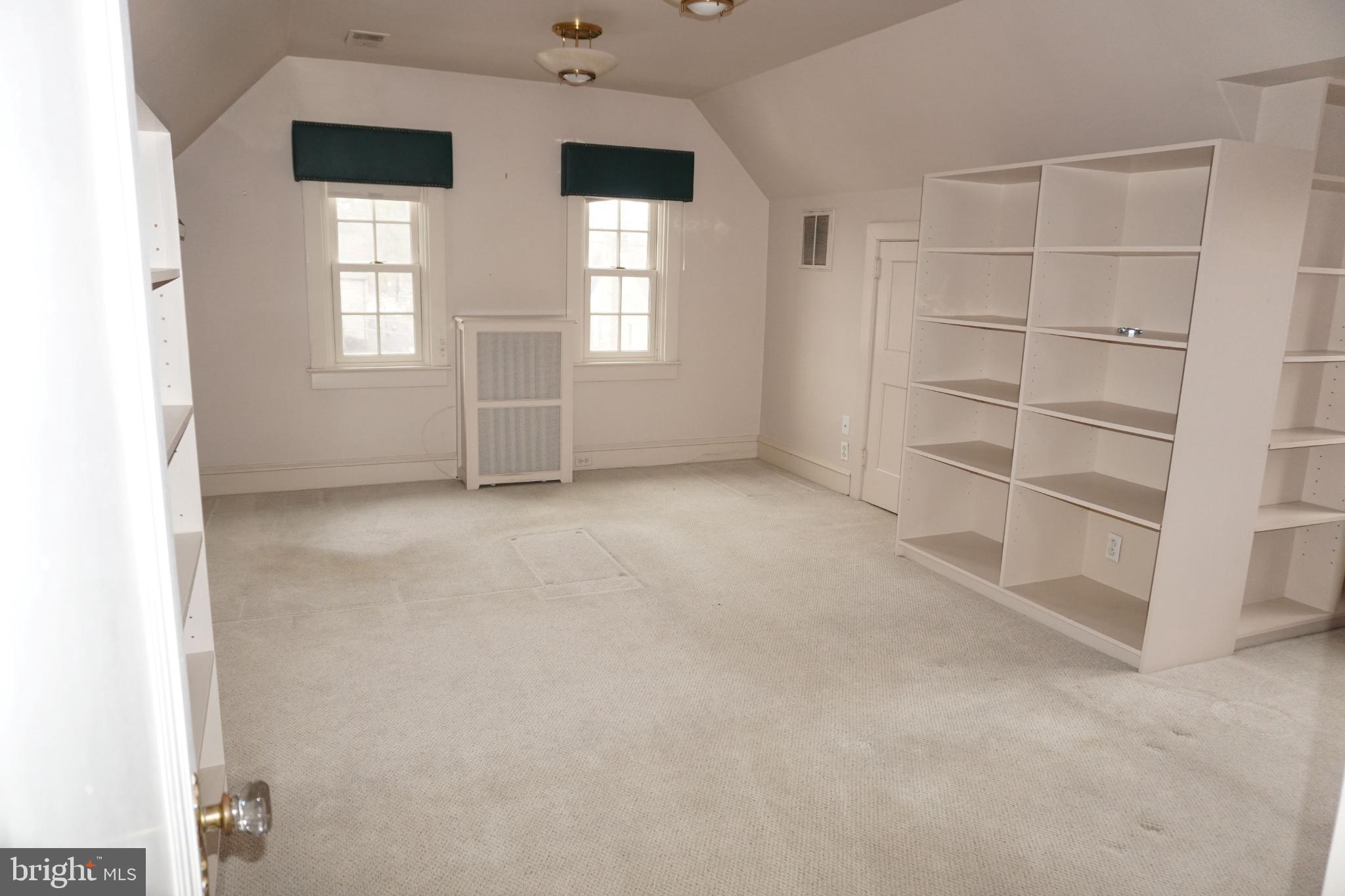 534 Kenwood Road Drexel Hill, PA 19026 - Photo 17 of 28 a view of an empty room with a window