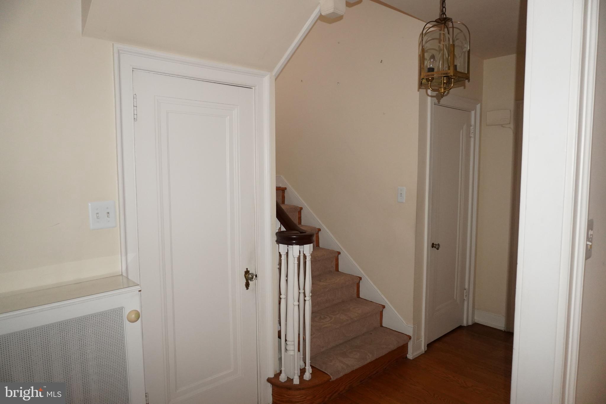 534 Kenwood Road Drexel Hill, PA 19026 - Photo 2 of 28 a view of a hallway with wooden floor and entryway