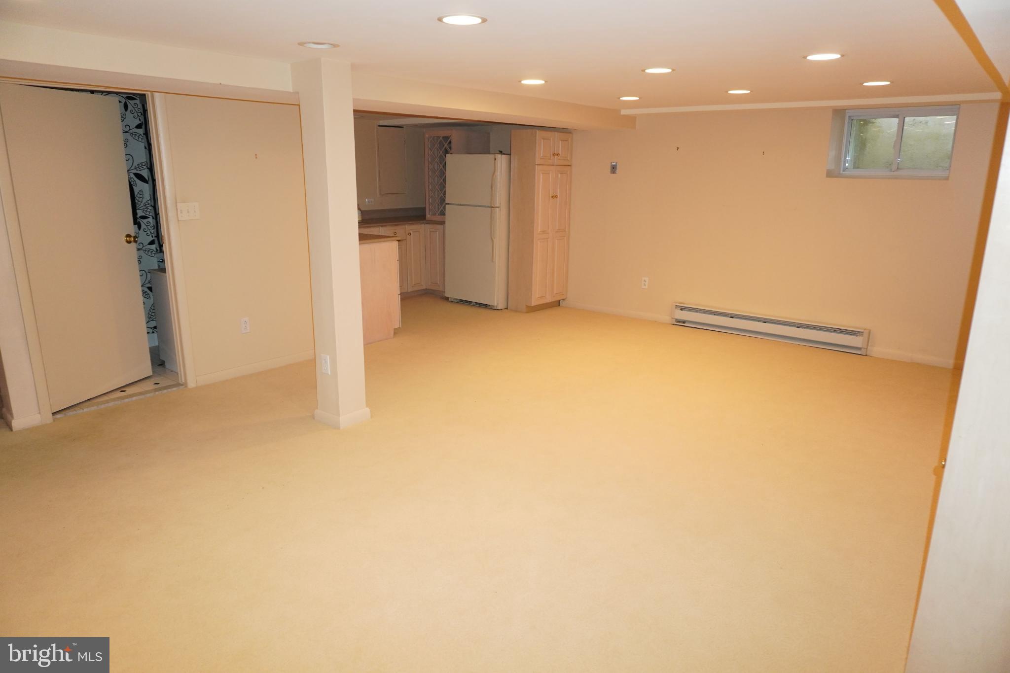 534 Kenwood Road Drexel Hill, PA 19026 - Photo 28 of 28 a view of empty room with wooden floor