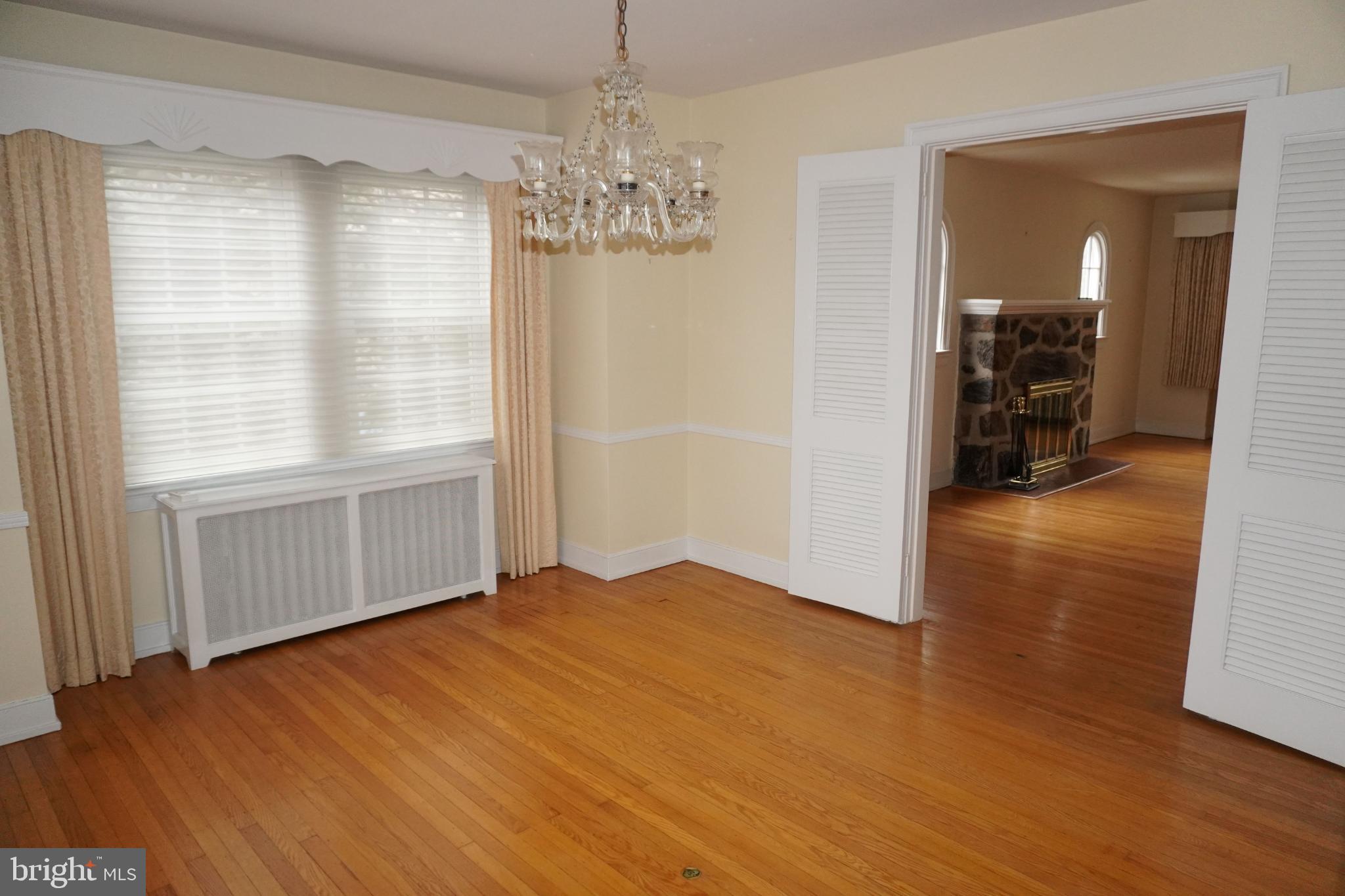 534 Kenwood Road Drexel Hill, PA 19026 - Photo 6 of 28 a view of empty room with wooden floor and fan