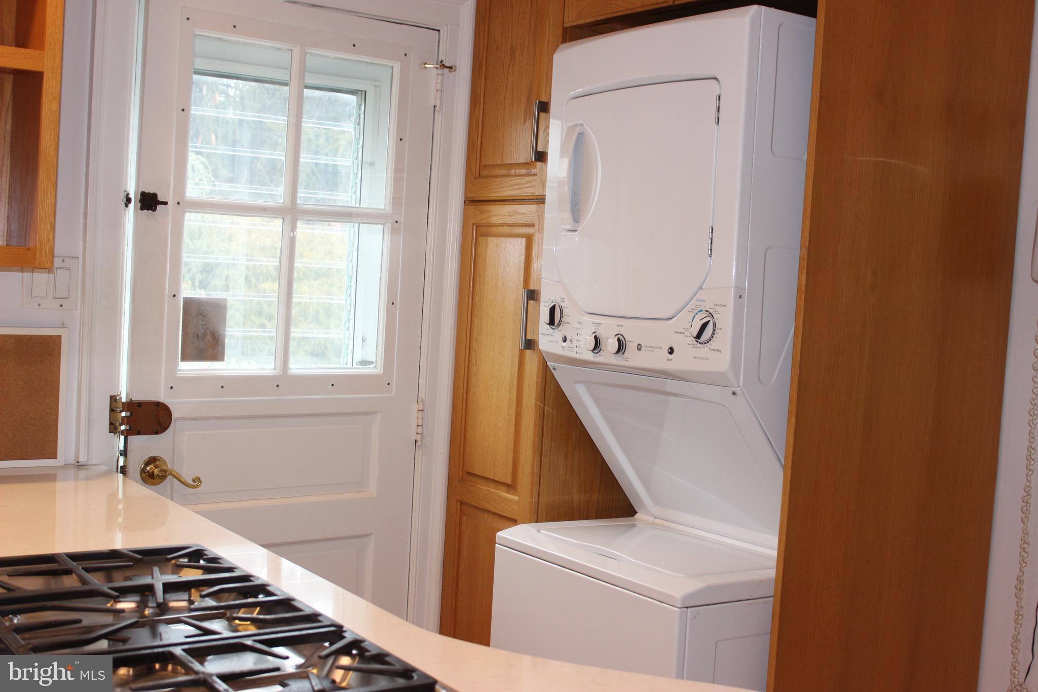 534 Kenwood Road Drexel Hill, PA 19026 - Photo 9 of 28 a room with a stove and a window