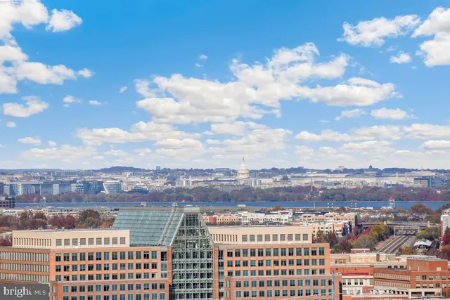 a kitchen with granite countertop stainless steel appliances and cabinets