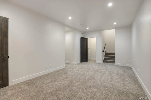 an empty room with a bathroom