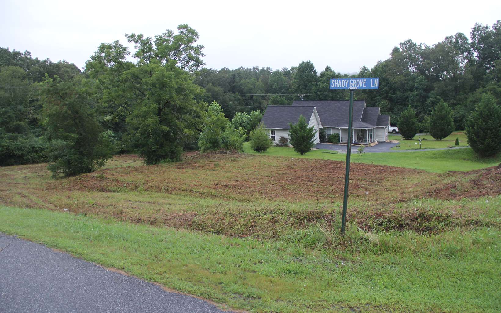 Lot11 Shady Grove Lane Blue Ridge, GA 30513 - Photo 1 of 1 a view of a house with a backyard