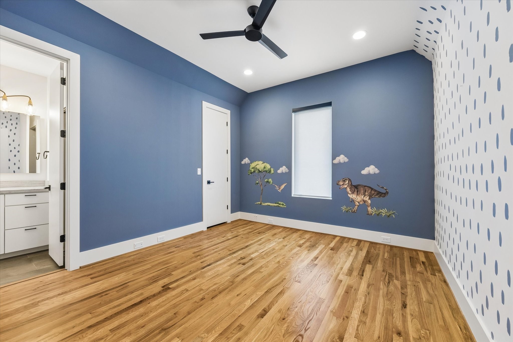 2705 Julian Street Houston, TX 77009 - Photo 39 of 50 Secondary bedroom. Vinyl decals can be removed.