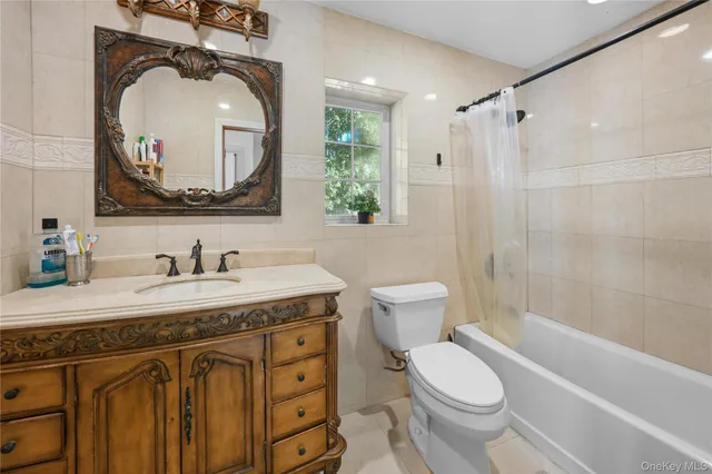 a bedroom with a bed and a table in it