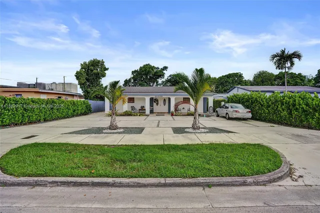 front view of house with a yard