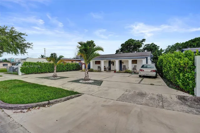 a house view with a garden space