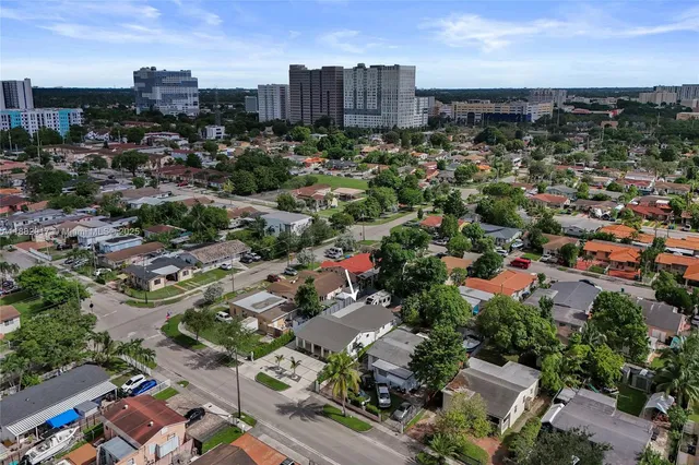 an aerial view of a city with lots of residential buildings