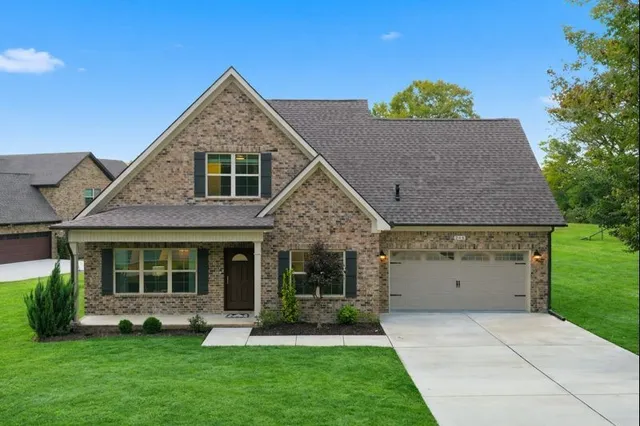 front view of a house with a yard