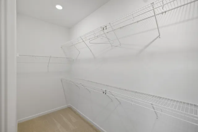 a view of a room with racks on the wall