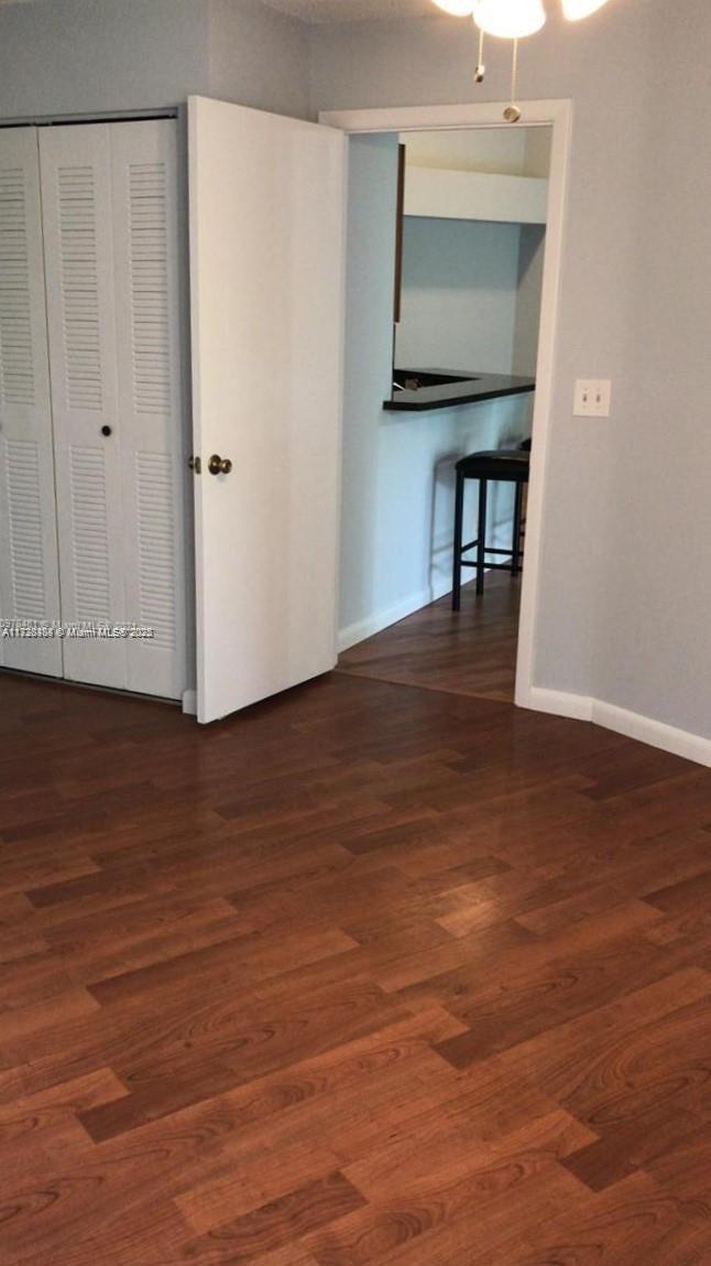 Summerbreeze Condominiums Sunrise, FL 33322 - Photo 11 of 12 a view of room with furniture and wooden floor