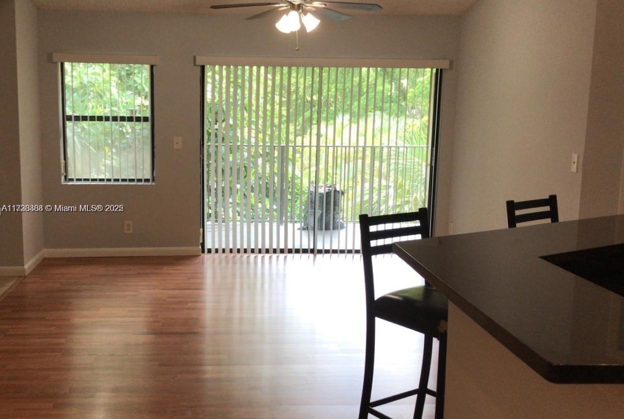 Summerbreeze Condominiums Sunrise, FL 33322 - Photo 4 of 12 a view of a balcony with furniture and a window