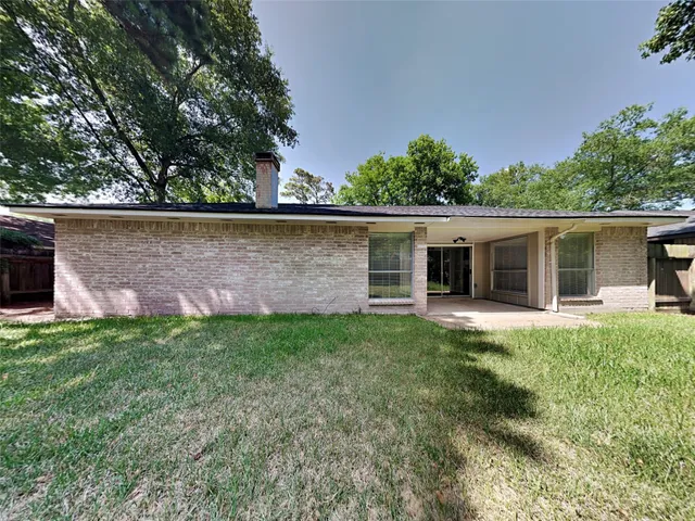 front view of house with a yard