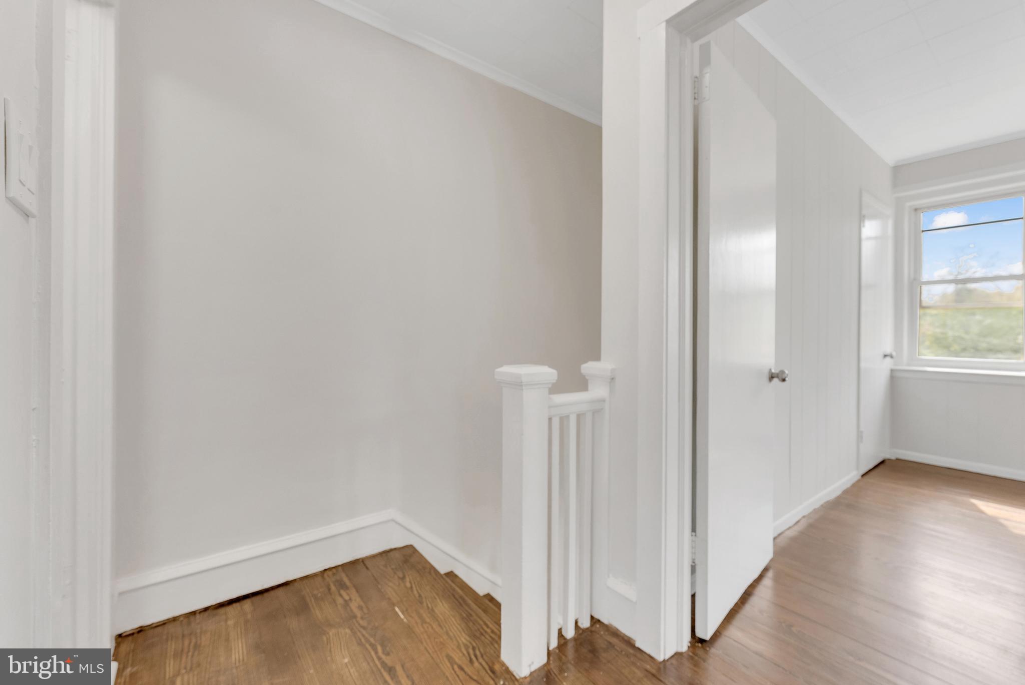 217 Pennsylvania Road Brooklawn, NJ 08030 - Photo 12 of 21 wooden floor in an empty room