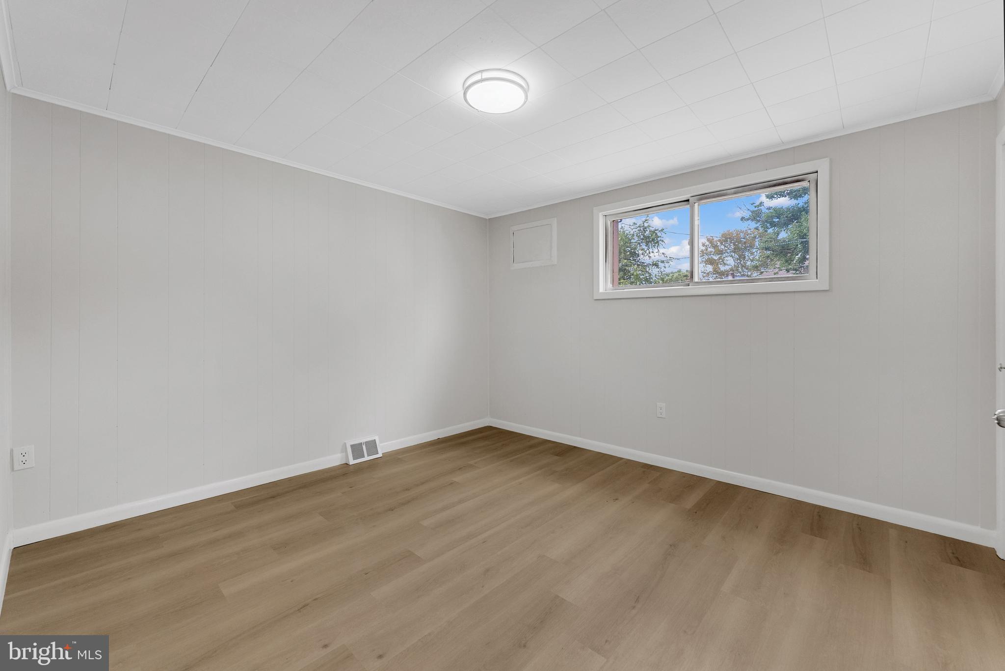 217 Pennsylvania Road Brooklawn, NJ 08030 - Photo 7 of 21 an empty room with a workbench