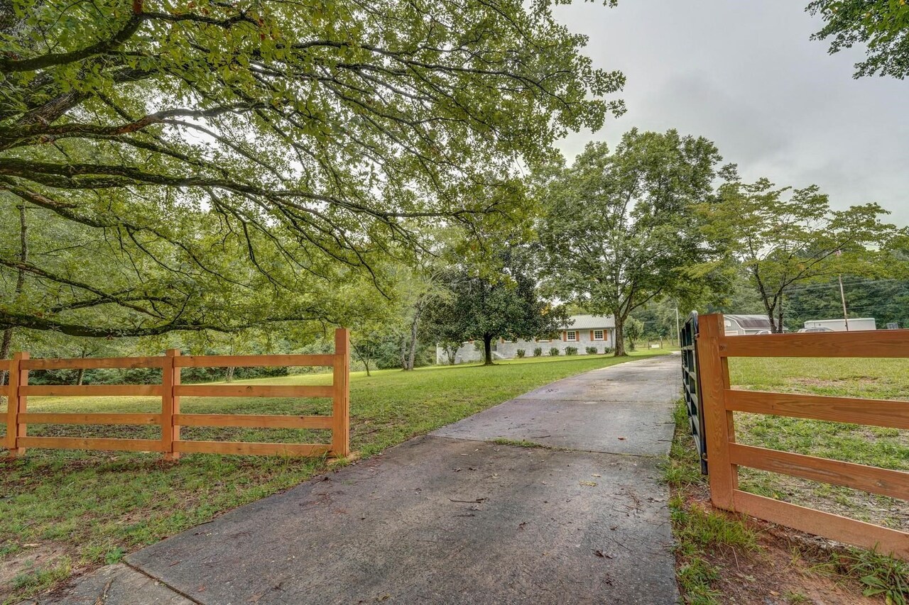 429 Biles Road Jackson, GA 30233 - Photo 1 of 1 a view of a yard with an tree