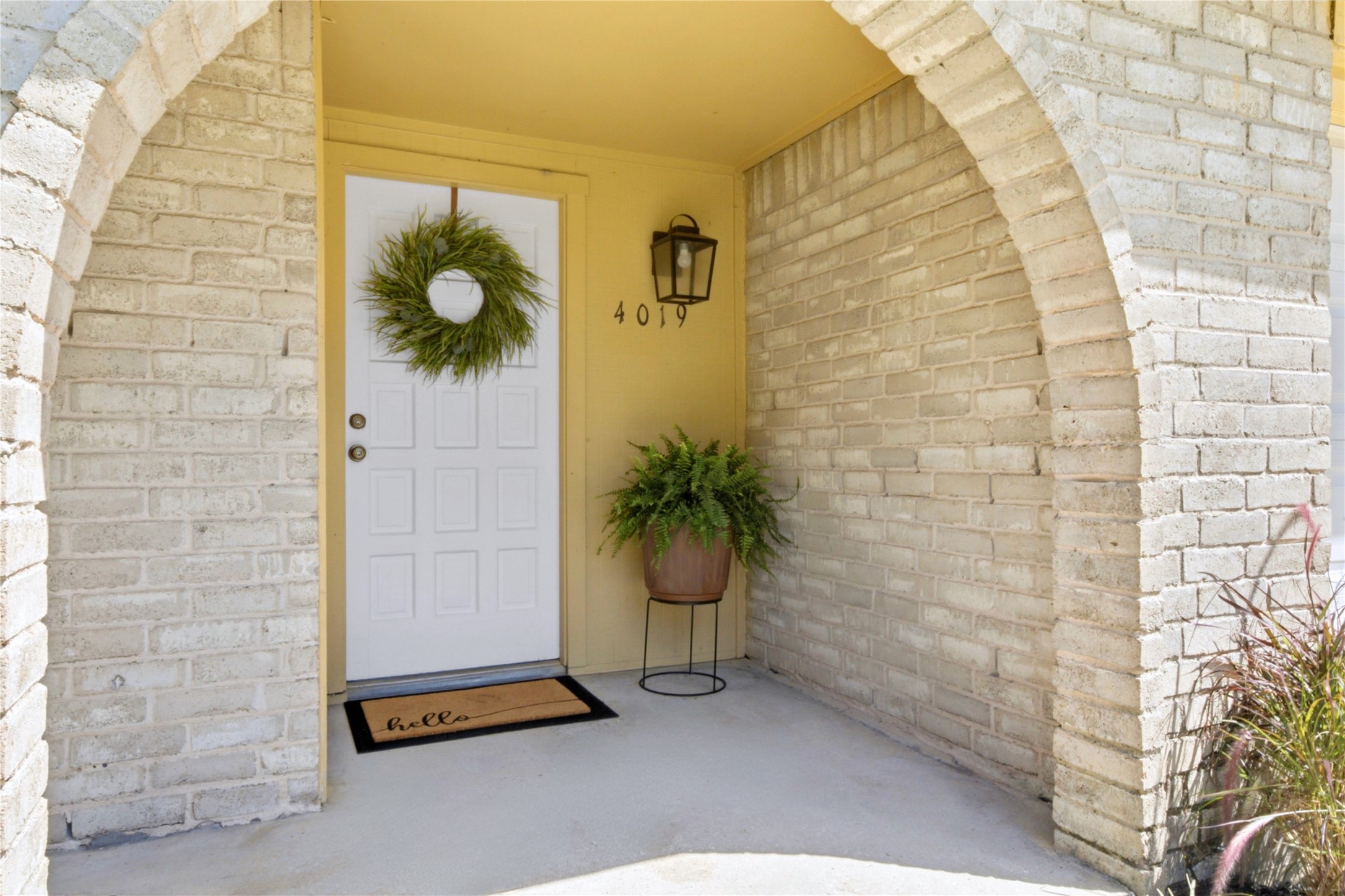 4019 Postwood Drive Spring, TX 77388 - Photo 2 of 50 a potted plant sitting in front of a door