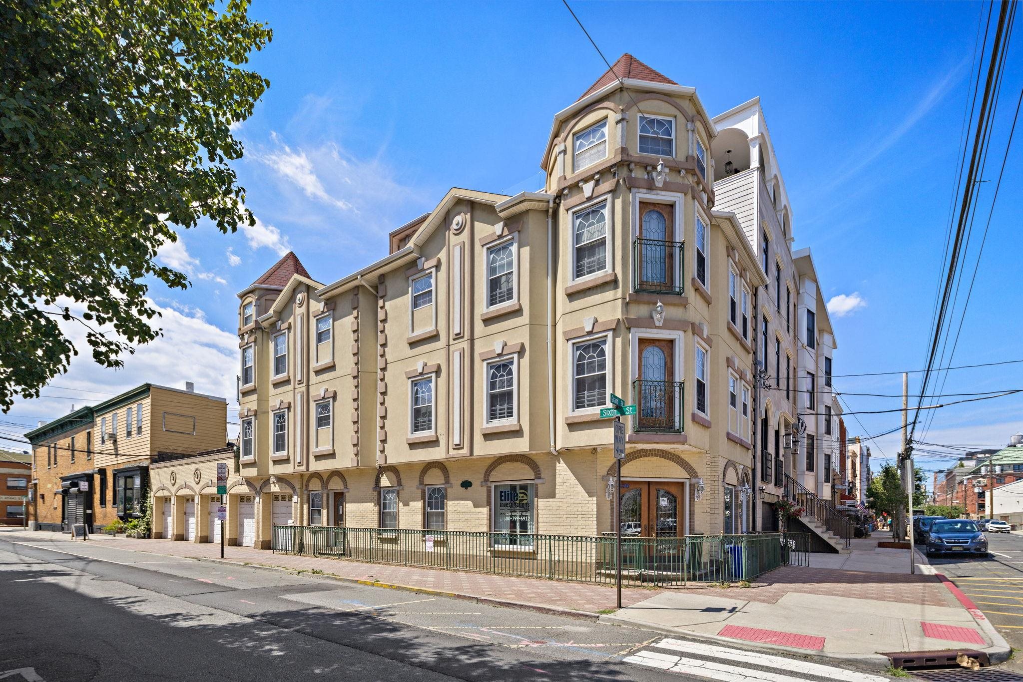 600 Grand Street, Unit 2 Hoboken, NJ 07030 - Photo 1 of 18 a front view of a building with a street
