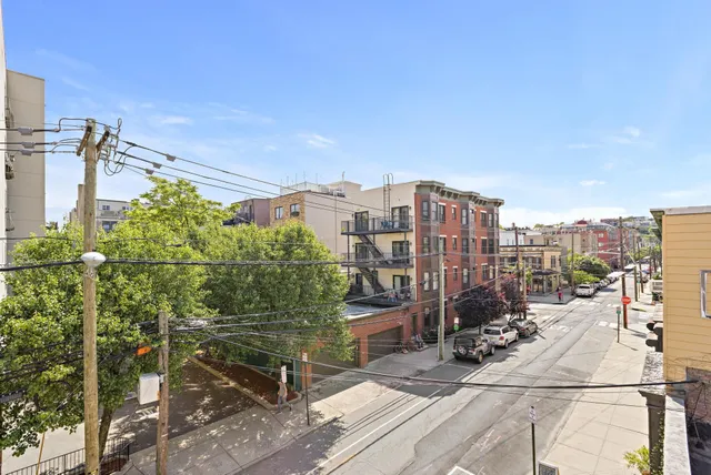 a view of a city with tall buildings