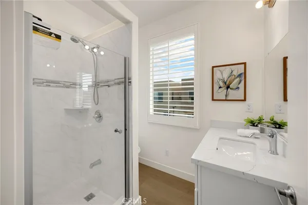 a view of city from balcony with seating space