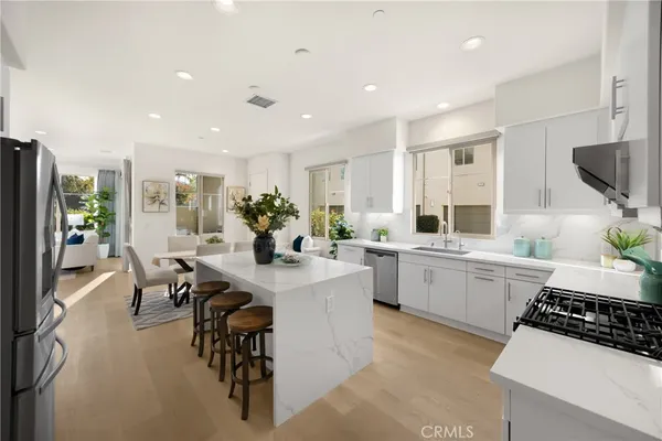 a kitchen with sink cabinets and counter space