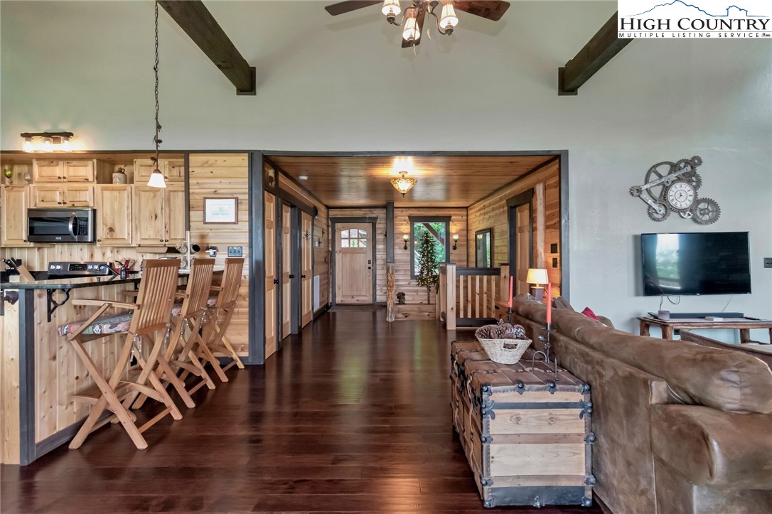 4879 Staghorn Road Purlear, NC 28665 - Photo 28 of 50 a living room with furniture and wooden floor
